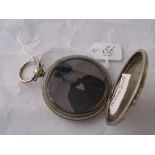 Victorian double sided circular locket with scroll engraved case