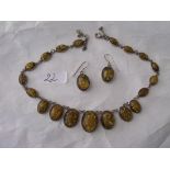 A silver mounted yellow stone necklace with earrings en suite 37g