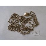 A good long heavy 9ct guard chain with 9ct heart tag 26g