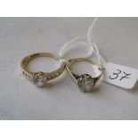 Two 9ct white stone rings