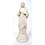 Third Period Belleek parian ware figure of Christ. An early 20th century porcelain figure of Christ,