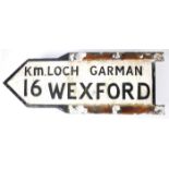 Wexford kilometers roadsign A cast alloy finger roadsign, the relief letters and numbers black