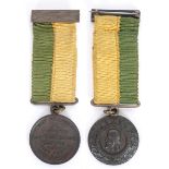 Parnell Commemorative medal A bronze commemorative medal by Johnson on a yellow and green ribbon