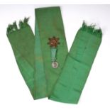 1875 Daniel O'Connell Centenary parade, marshal's sash. A green poplin sash with gilt bullion star