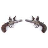 Circa 1815 Pair of English flintlock muff pistols A pair of flintlock muff pistol with walnut