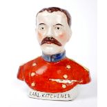 1914-1918 Earl Kitchener, Staffordshire moneybox. A Staffordshire earthenware money box in the