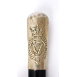 Royal Irish Constabulary swagger stick. An early 20th century white metal topped, ebonised, tapering