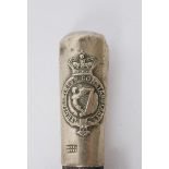 Royal Irish Constabulary swagger stick An early 20th century white metal topped, blackened-brass,