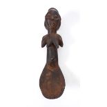 Early 20th century, Lake Victoria, Luba tribe, fertility spoon. A wooden totem carved in the form of