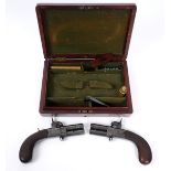Early 19th century, cased pair of turnover pocket pistols. A pair of percussion turnover pocket