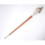 Highland pipe-band, bandleader's mace. A maple staff with globular white metal terminal capped