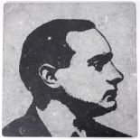 Pádraig Pearse, portrait sculpture. A low-relief portrait of Padraig Pearse on a limestone slab by