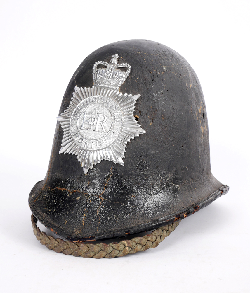 19th century Police helmet. The interior stencilled 'Sgt - Jacobs - 23'. With modern Metropolitan