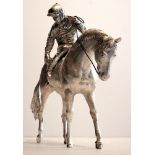 2002 Silver sculpture of a racehorse and jockey. A superb cast silver sculpture of a racehorse