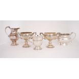 Celtic-revival silver wares. An Irish silver Christening mug, hallmarked for Dublin, 2000; and a