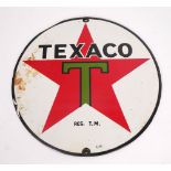 1930s Texaco motor spirit enamel sign. A circular, single-sided, enamel sign from a petrol pump. The