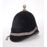 1920s Garda Siochana helmet. Cloth helmet with white metal shamrock fittings and chain-link