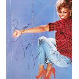 Tina Turner autograph signature A photograph of Tina Turner from a magazine inscribed in black