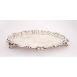 Victorian silver salver. A Victorian silver circular salver, the cast pie-crust rim enclosing a