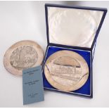 1975 Irish silver commemorative plates. A pair of Irish silver circular plates, the central