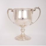 1930s silver trophy cup. A large early 20th century silver two-handled, trophy cup, the plain body