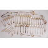 A large accumulation of silver flatware. A mixed lot of hallmarked silver flatware comprising part-