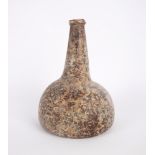 18th century onion-shaped glass bottle. A light green glass bottle with string rim, tapering neck