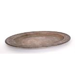 A George III silver oval salver. A plain oval salver, of heavy gauge, the edge beaded, engraved