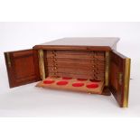 Coin collector's cabinet A mahogany 14-tray lockable collector's cabinet.