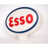 Mid-20th century Esso petrol pump globe. A perspex petrol pump globe of typical oval form, printed