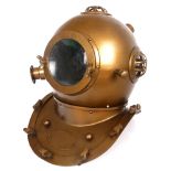 A marine engineer's trade sign in the form of a diving helmet. A metal life-size model of a diving