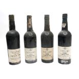 1970-1983 Four bottles of Taylor's vintage port. 1970, 1977, 1980 and 1983, each 75cl, capsules