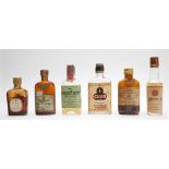 Old Donegal Irish whiskey and five Irish whiskey miniatures. A 1/10 pint bottle of Old Donegal 10-