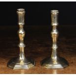 A Near Pair of 18th Century Brass Candlesticks.