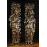A Pair of 17th Century Carved Oak Figural Supports in the the form of ladies dressed in flowing