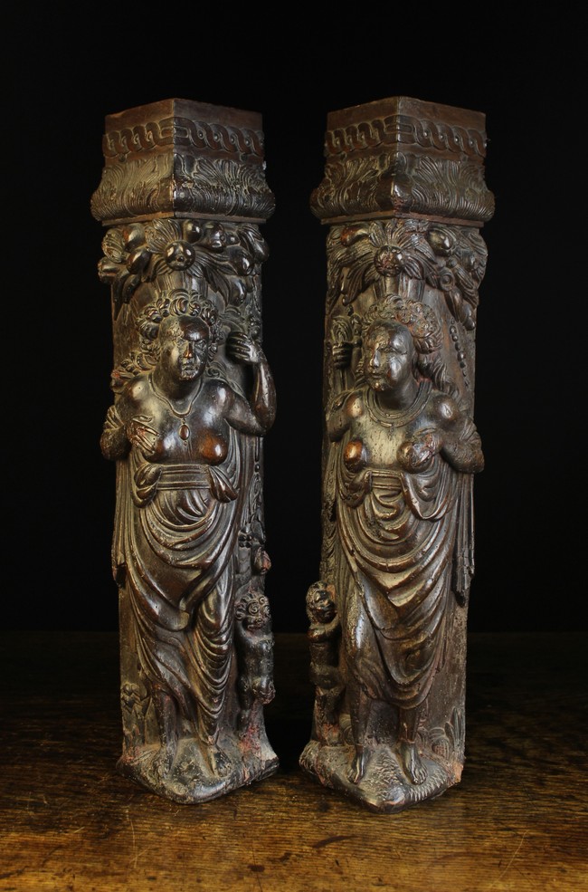 A Pair of Renaissance Carved Oak Figural Corner Posts.