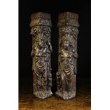 A Pair of Renaissance Carved Oak Figural Corner Posts.