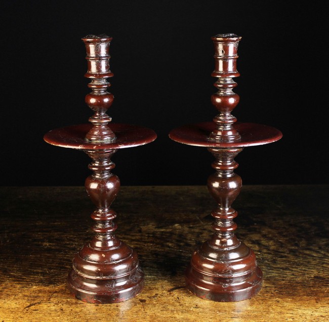 A Pair of Large Early 18th Century Turned Treen Heemskirk Candlesticks with red lacquered finish,