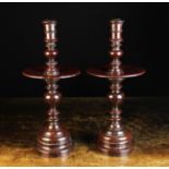 A Pair of Large Early 18th Century Turned Treen Heemskirk Candlesticks with red lacquered finish,