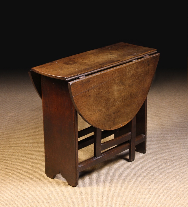 A Small 18th Century Oak Drop leaf Table.