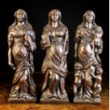 A Set of Three 17th Century Flemish Carved Oak Allegorical Pilasters/Finial Figures personifying