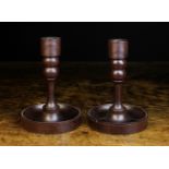 A Pair of Unusual 19th Century Treen Candlesticks.