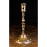 A Bronze Candlestick.