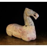 A Chinese Han Dynasty Pigmented Pottery Horse in two sections,