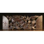 A Dark Patinated Oak Fragment Panel pierced and carved with undulating Gothic foliage around a