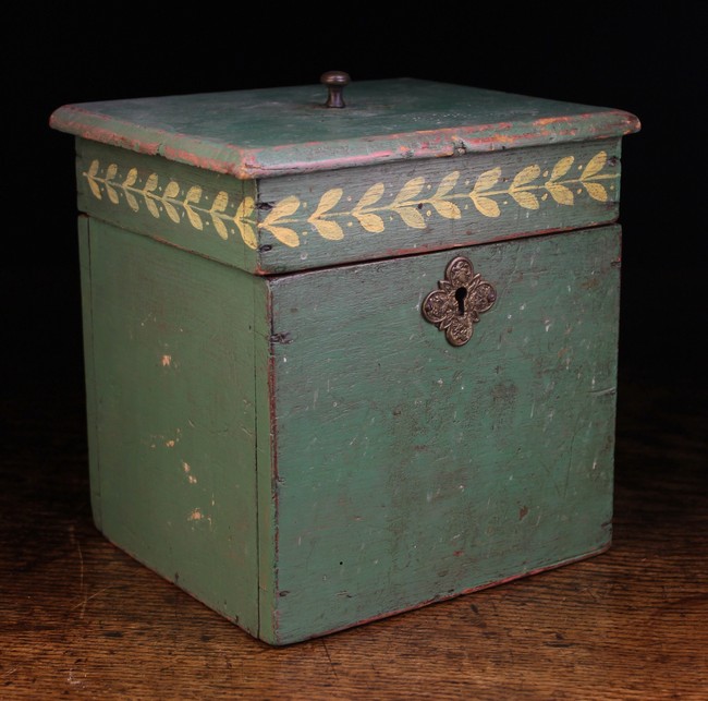 A 19th Century Square Wooden Box painted green and decorated with a band of laurel leaves and