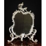 A Late 19th Century Rococo Style Silver Plated Strut Mirror.