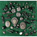 A Collection of Victorian & Later Carved Jet and faux jet Jewellery to include brooches and