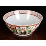 A Large Antique Chinese Bowl decorated in rusty orange,