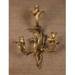 A Large Three Branch Ormolu Appliqué in the Louis XV style.